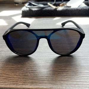 Men’s sunglasses and bag.